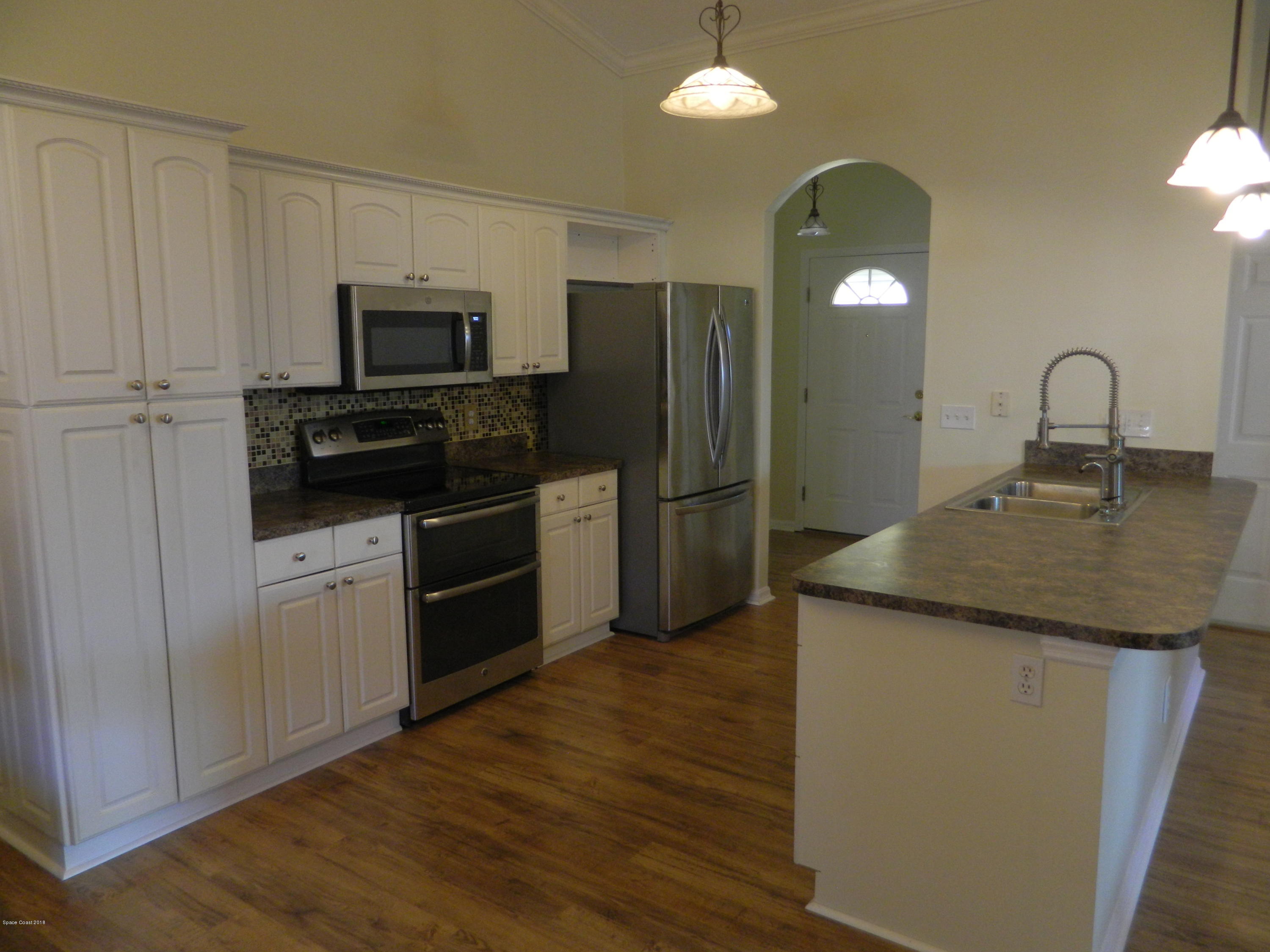 1778 Palm Ridge Road Melbourne, FL 32935 - Photo 4 of 19 Kitchen-Stainless Appliances