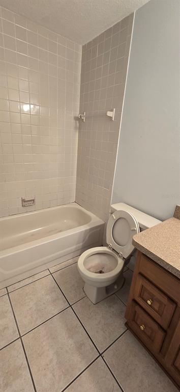 3321 Southwest 34th Ave Circle, Unit 5 Ocala, FL 34474 - Photo 9 of 10 a bathroom with a toilet and a shower