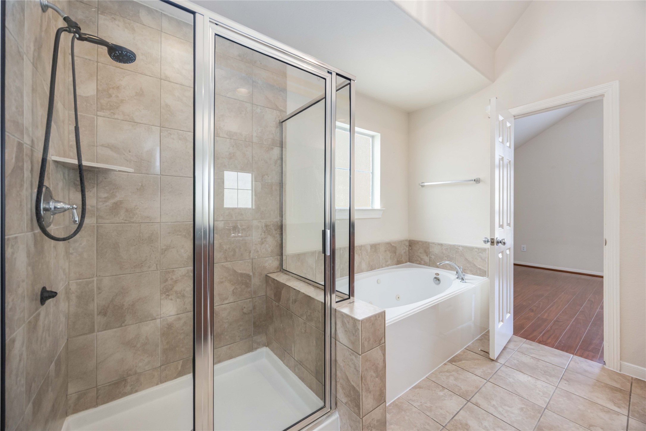 3008 Clearview Circle Houston, TX 77025 - Photo 26 of 33 a bathroom with a tub shower and sink