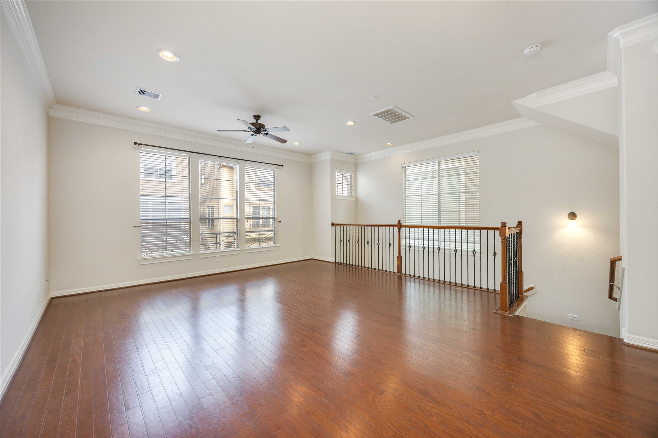 3008 Clearview Circle Houston, TX 77025 - Photo 5 of 33 a view of an empty room with wooden floor and a window