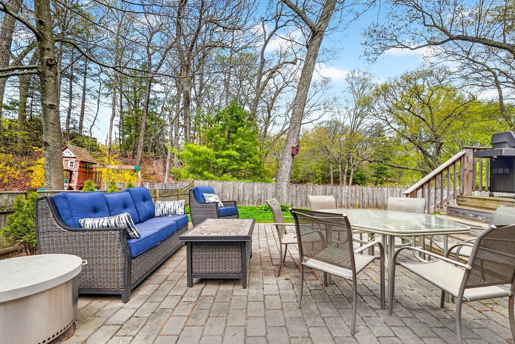 87 Payson Road Brookline, MA 02467 - Photo 35 of 41 a view of a patio with a backyard