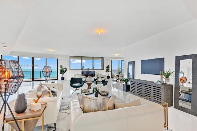 a table with a potted plant on it and a table