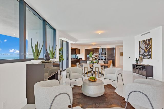 a brick house with a bench in front of it