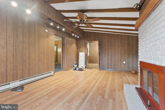 a view of a livingroom with a staircase