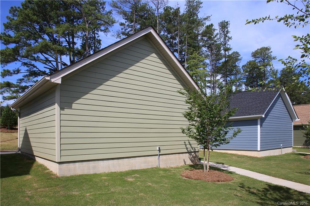 144 Helton Lane, Unit 35 Fort Mill, SC 29708 - Photo 14 of 18 a view of backyard with a garden and plants