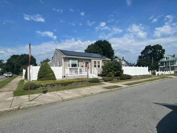 a view of house with outdoor space and street view