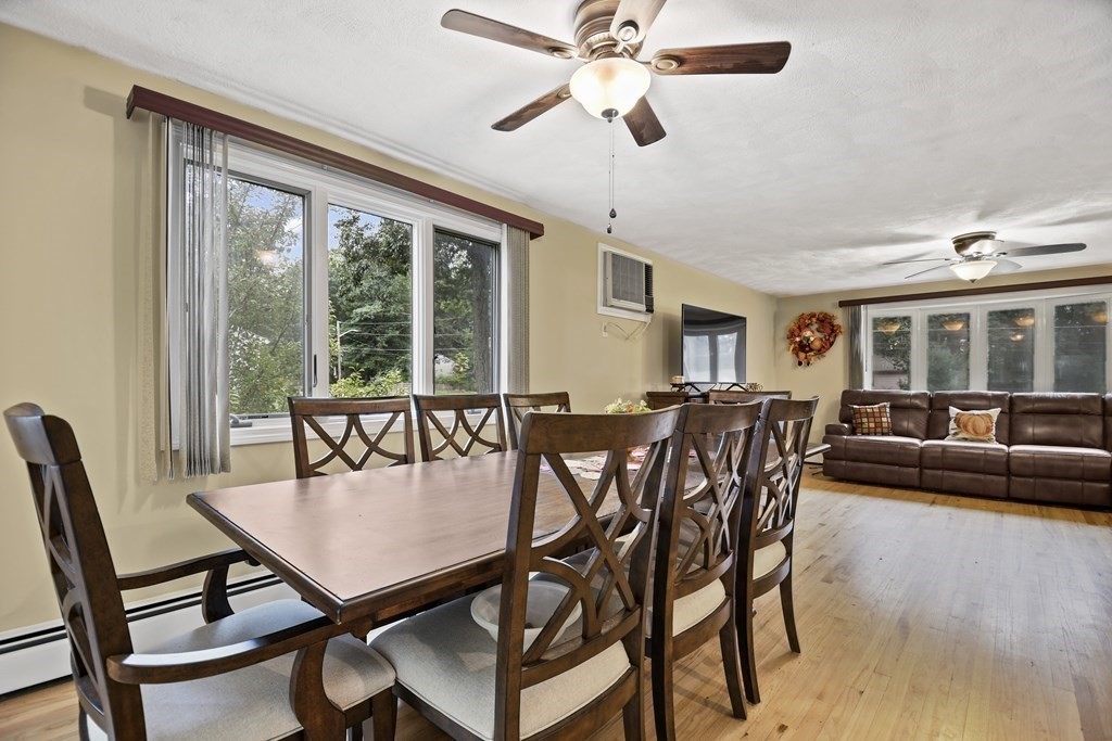 14 Porter Street Billerica, MA 01821 - Photo 11 of 33 a view of a dining room with furniture window and wooden floor