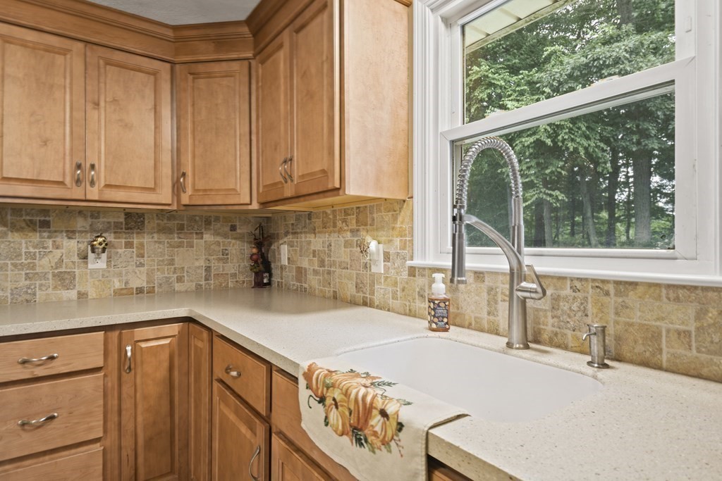 14 Porter Street Billerica, MA 01821 - Photo 15 of 33 a kitchen with a sink and large window