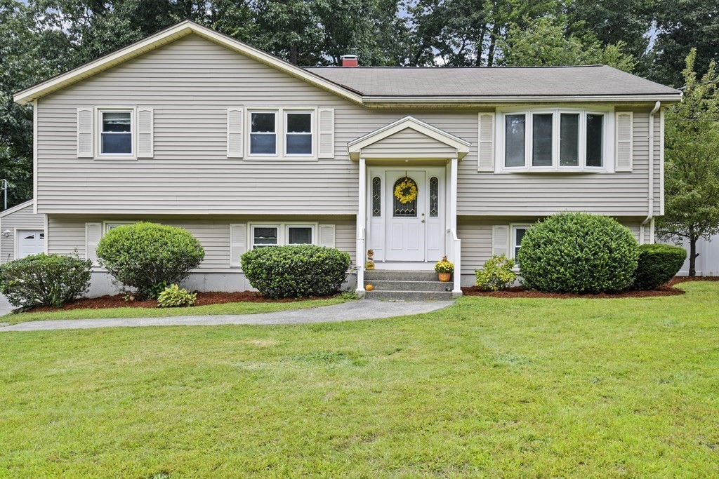 14 Porter Street Billerica, MA 01821 - Photo 2 of 33 a view of a house with backyard and garden