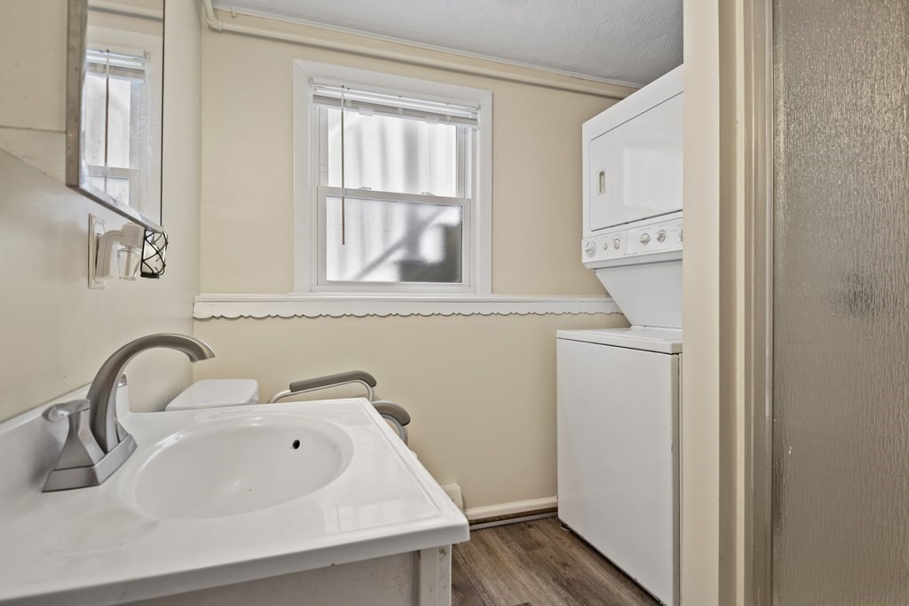 14 Porter Street Billerica, MA 01821 - Photo 25 of 33 a bathroom with a sink and a window