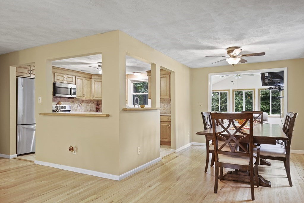 14 Porter Street Billerica, MA 01821 - Photo 6 of 33 a view of a dining room with furniture window and wooden floor