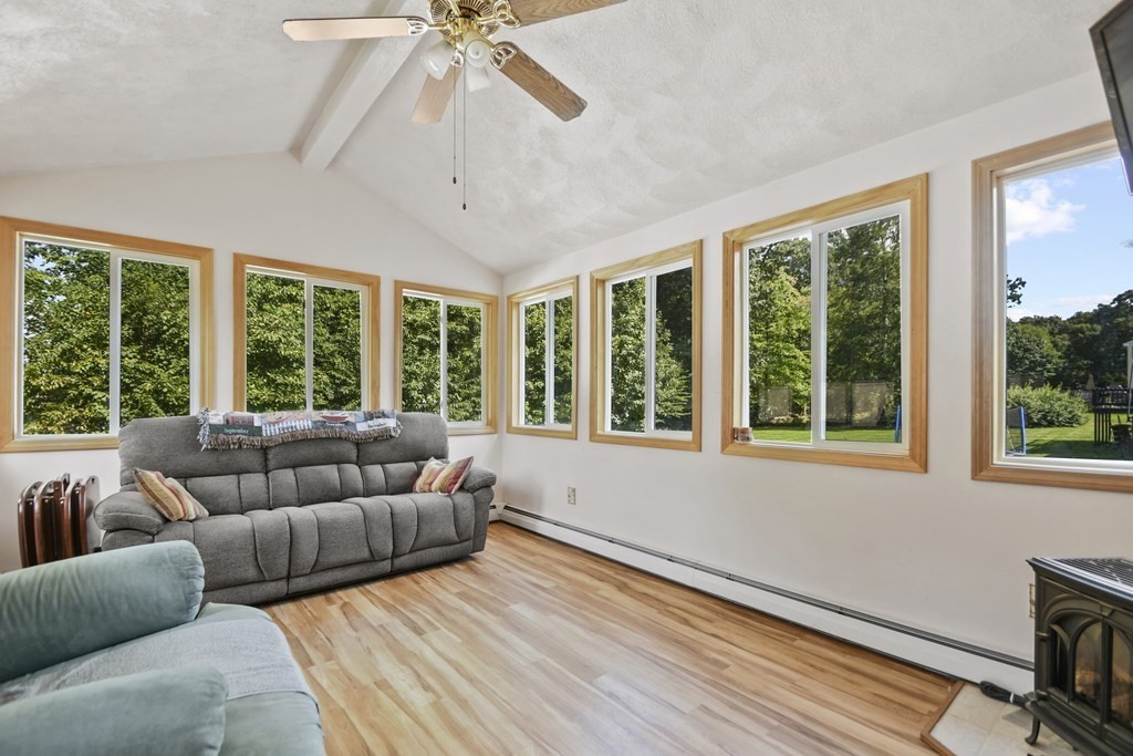14 Porter Street Billerica, MA 01821 - Photo 8 of 33 a living room with furniture and a large window