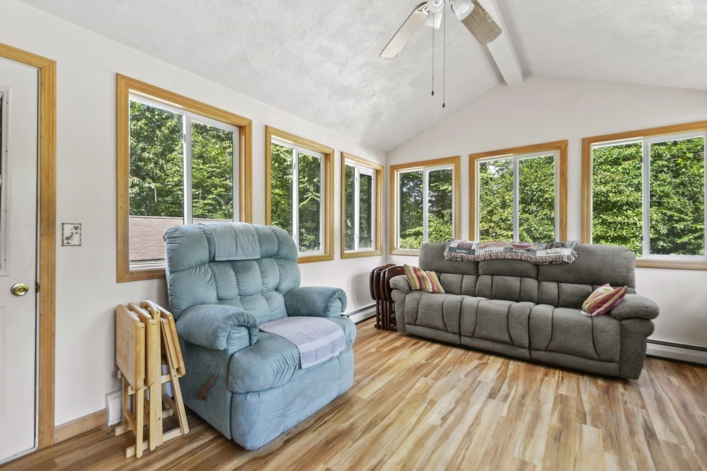 14 Porter Street Billerica, MA 01821 - Photo 9 of 33 a living room with furniture and a large window