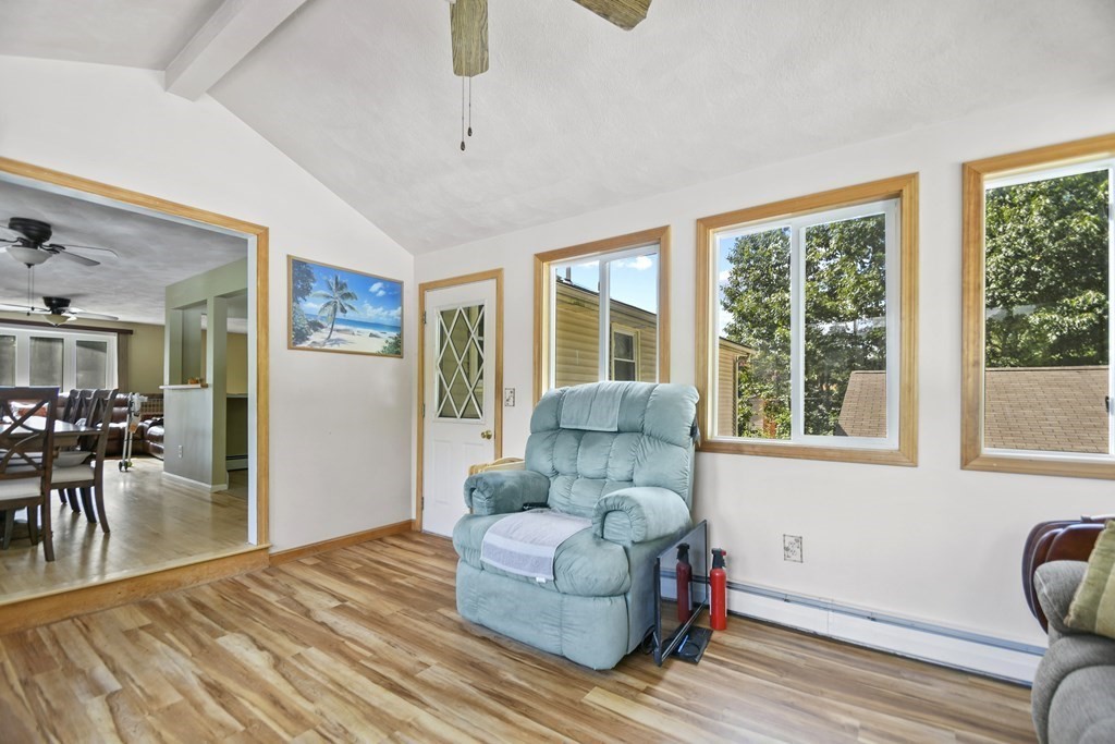 14 Porter Street Billerica, MA 01821 - Photo 10 of 33 a living room with furniture and a large window