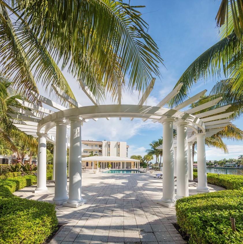 611 East Woolbright Road, Unit A102 Boynton Beach, FL 33435 - Photo 5 of 8 Pool entrance