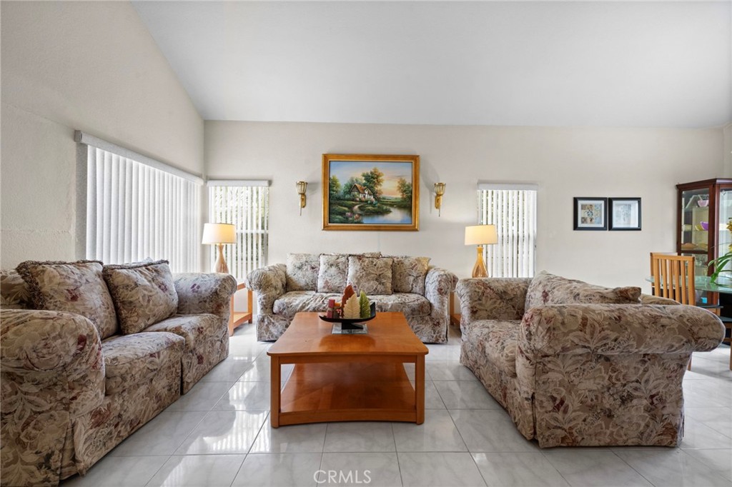 605 Bronco Way Walnut, CA 91789 - Photo 11 of 69 a living room with furniture and a window
