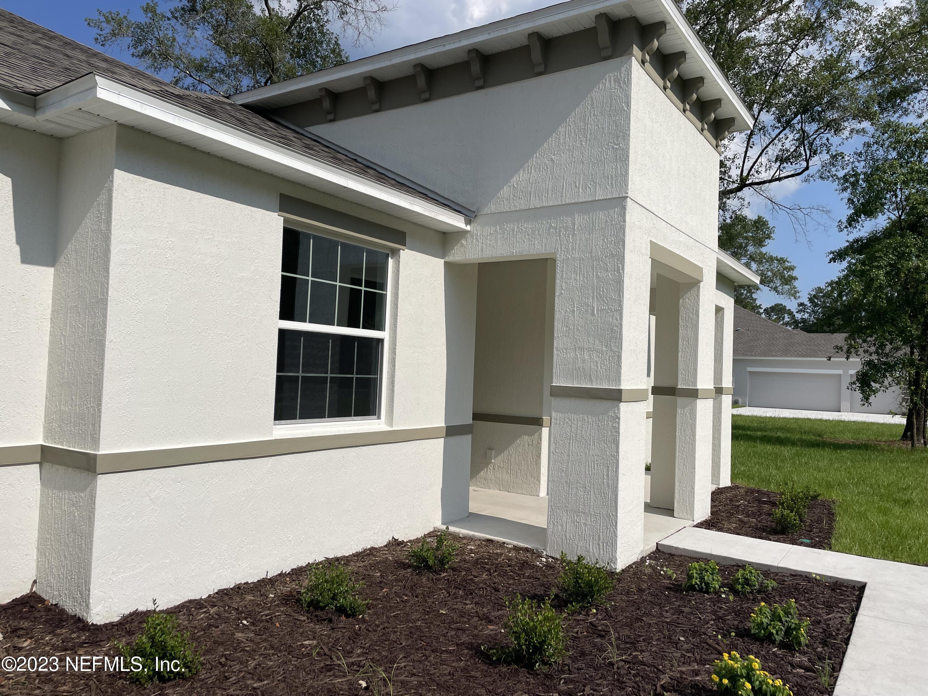 1515 Lake Foxmeadow Road Middleburg, FL 32068 - Photo 3 of 22 a view of an entrance of the house