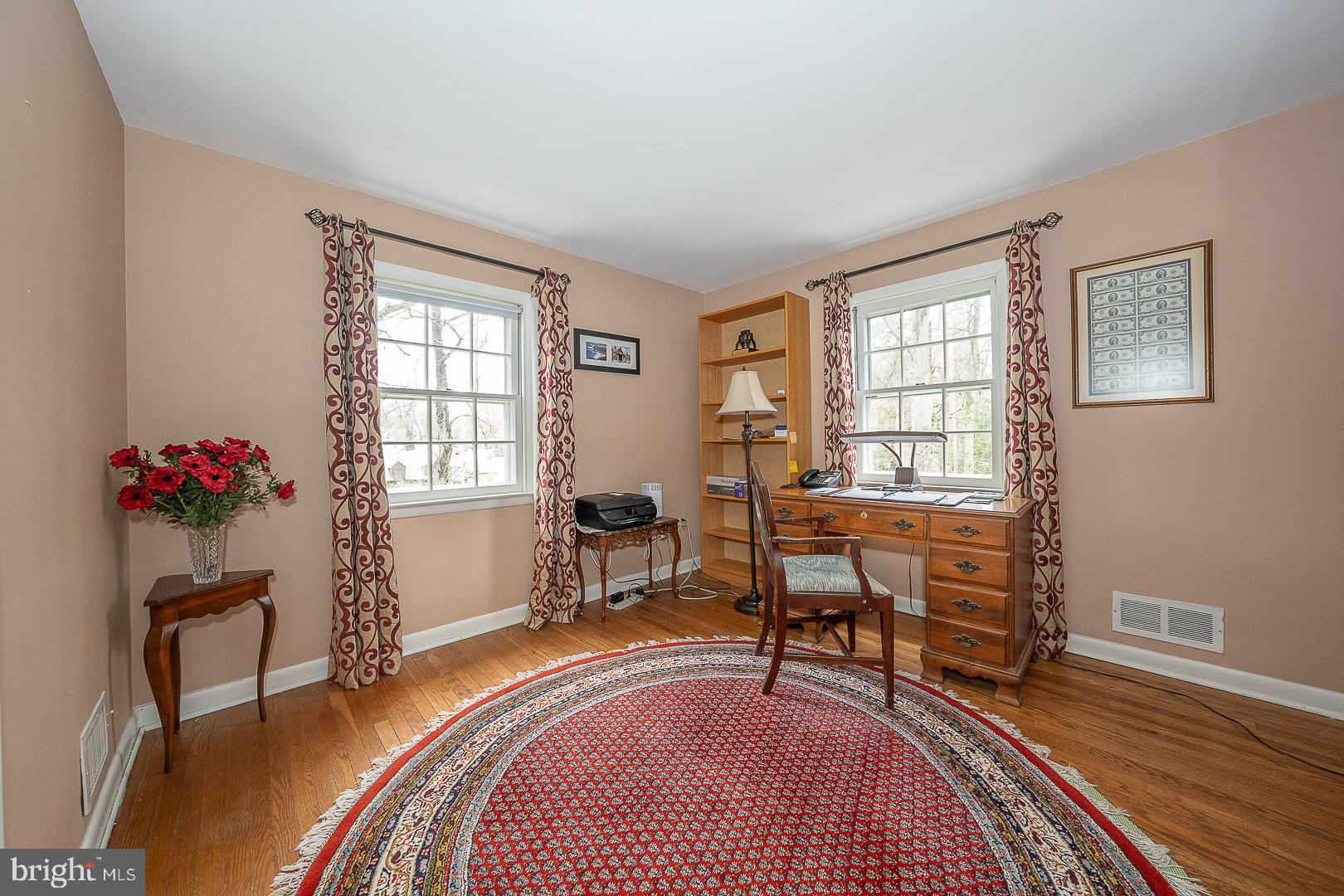 430 Upper Gulph Road Strafford, PA 19087 - Photo 19 of 32 a living room with furniture a window and a potted plant