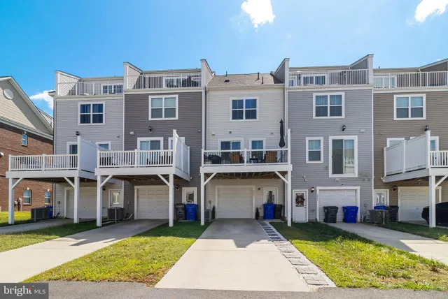 a view of building with an outdoor space and seating