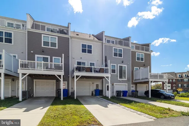 a view of front a building with a yard