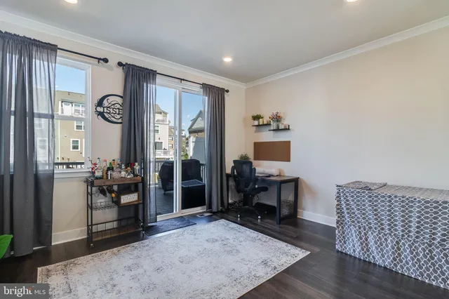 a view of a livingroom with furniture and front door