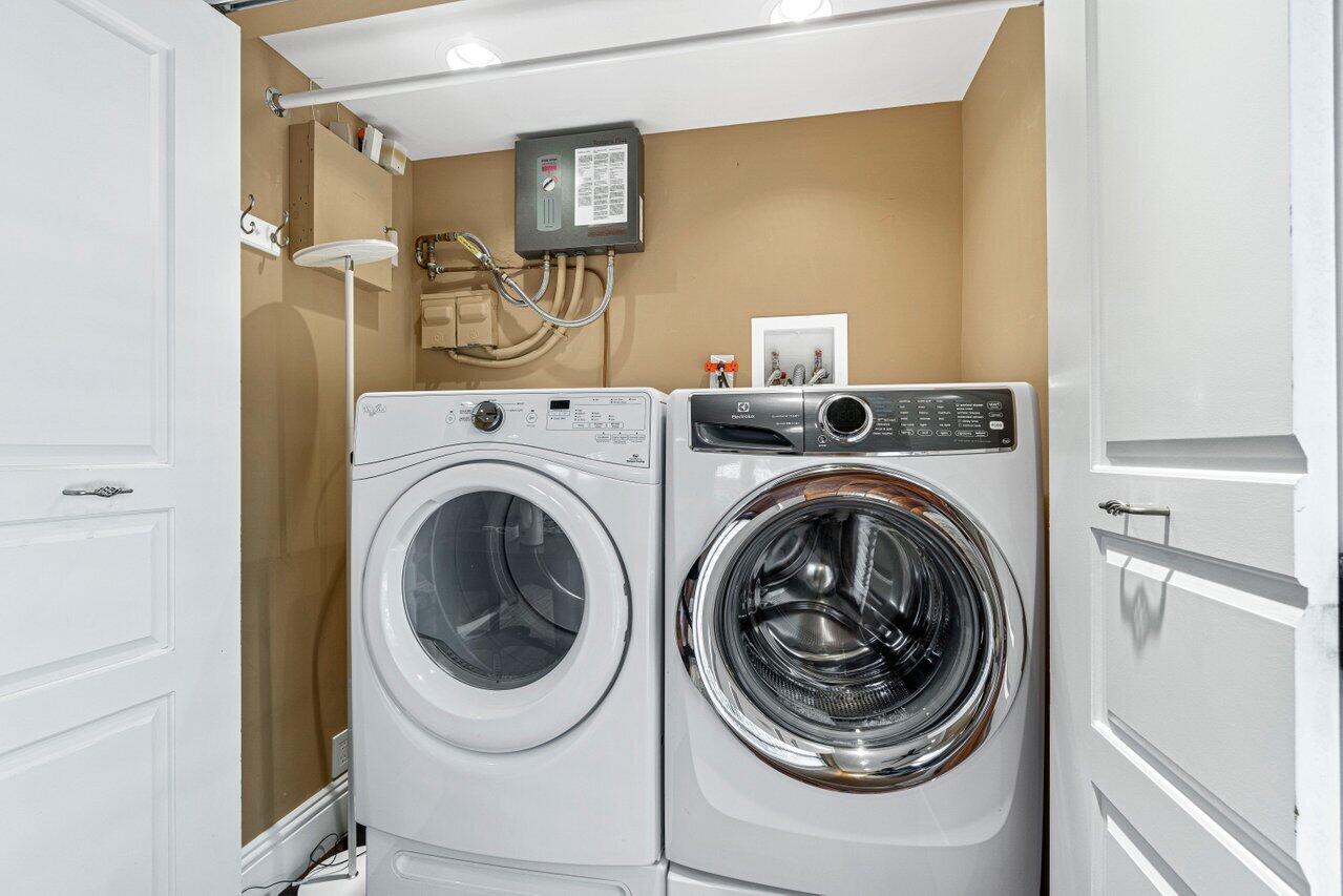 870 Northwest 7th Street Boca Raton, FL 33486 - Photo 32 of 37 a utility room with dryer and washer