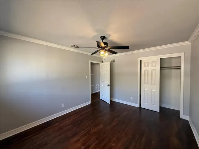 a view of a livingroom with wooden floor