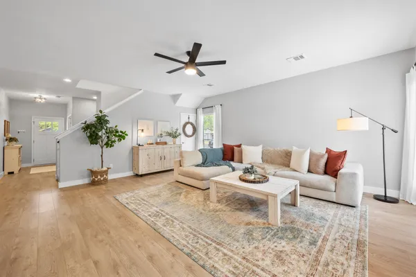 a living room with furniture and a couch