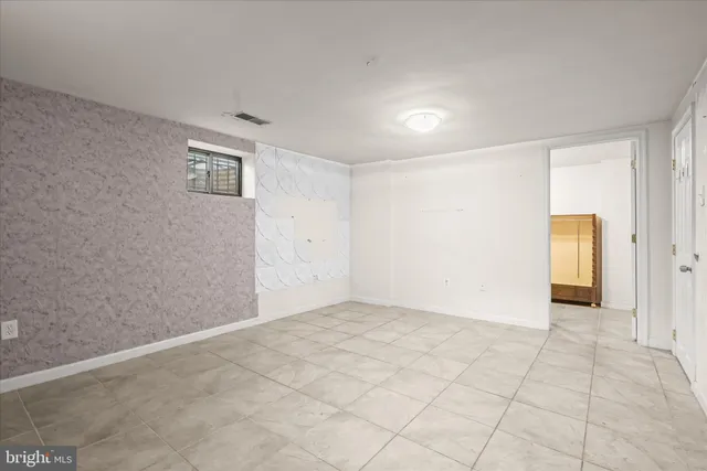 an empty room with a natural light