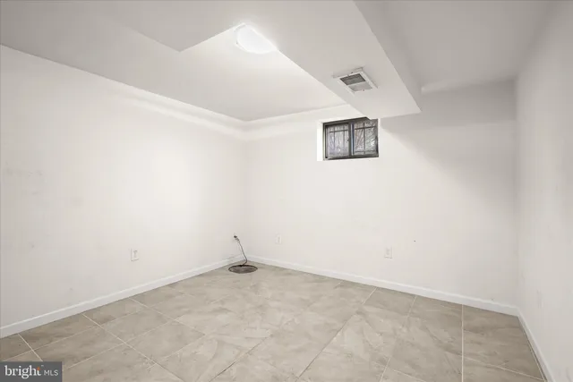 an empty room with a hallway