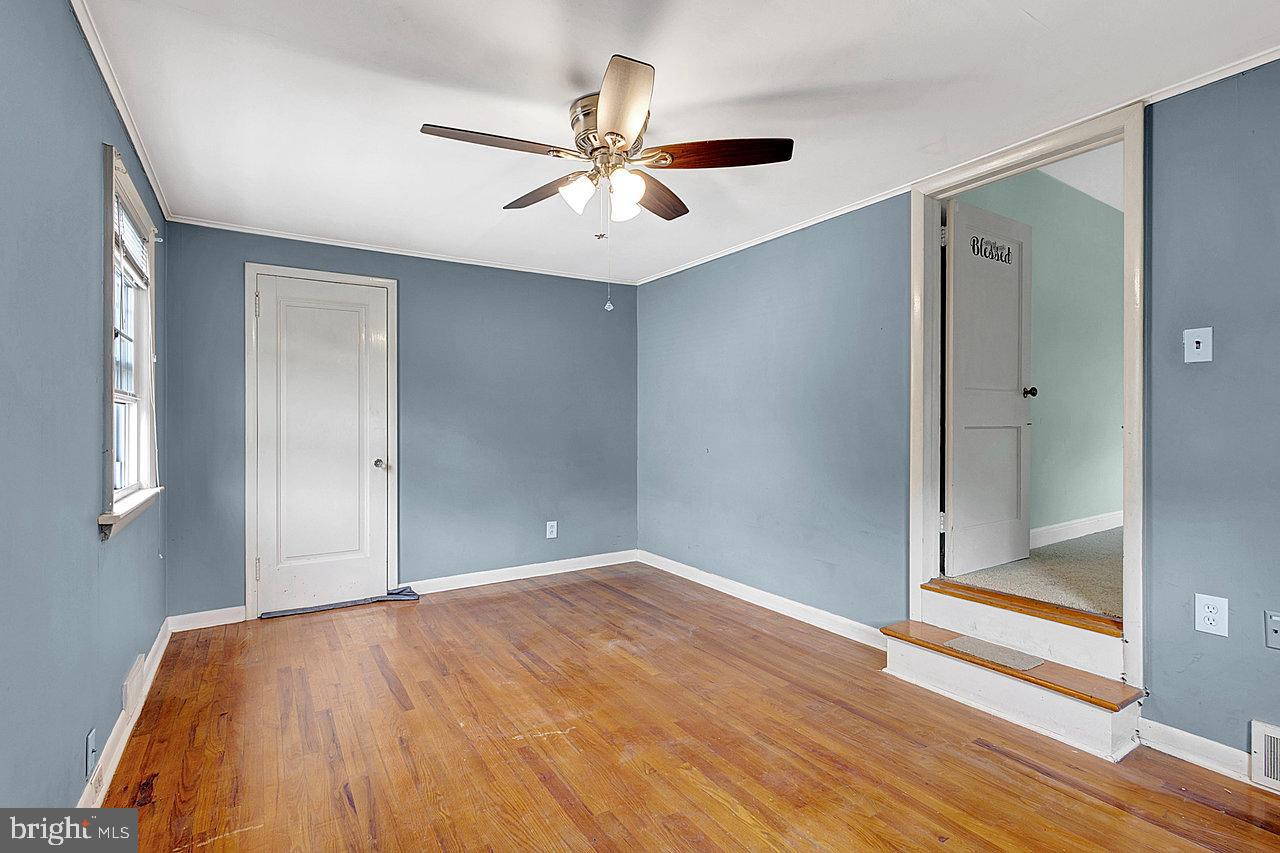 415 Sutherland Road Ewing, NJ 08618 - Photo 15 of 28 a view of empty room with wooden floor