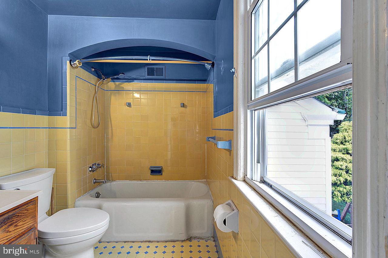 415 Sutherland Road Ewing, NJ 08618 - Photo 17 of 28 a bathroom with a toilet and a shower