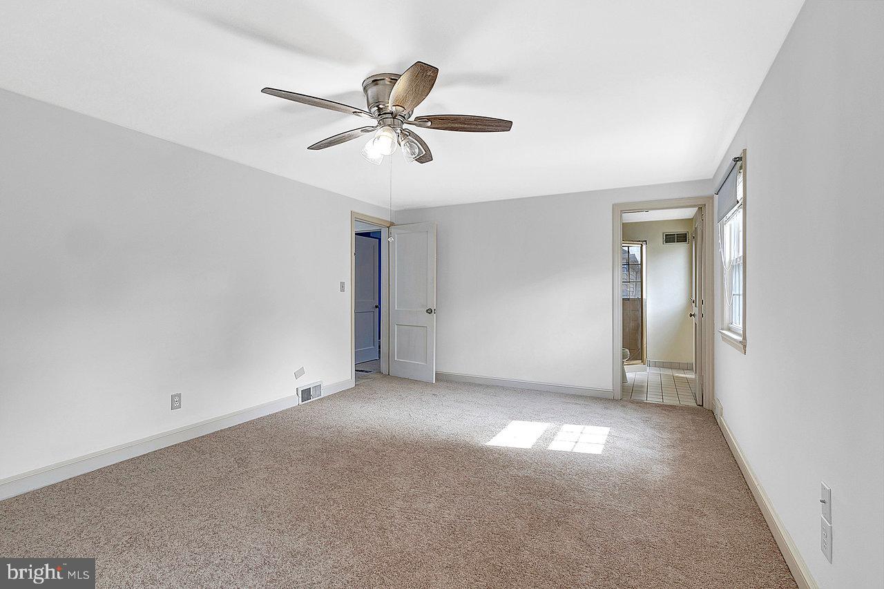 415 Sutherland Road Ewing, NJ 08618 - Photo 20 of 28 a view of empty room with window