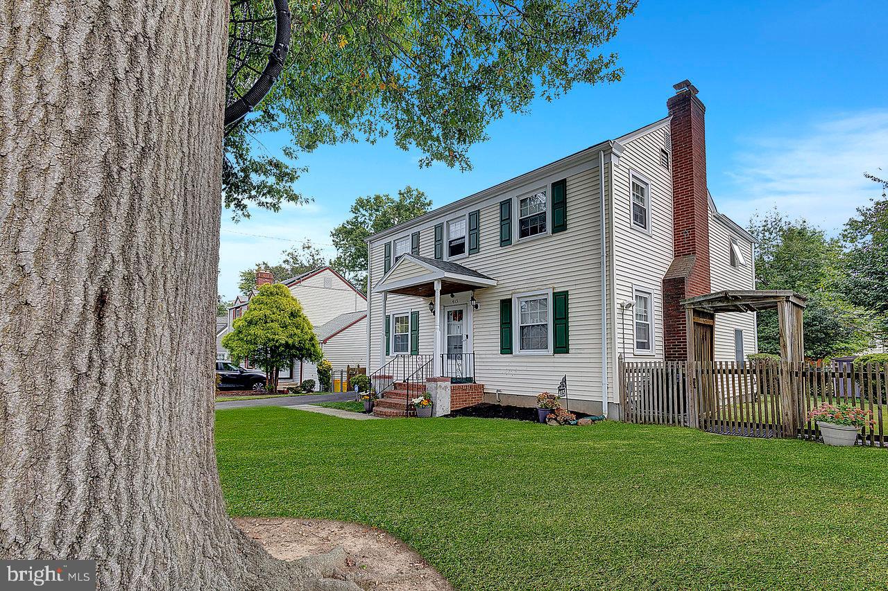 415 Sutherland Road Ewing, NJ 08618 - Photo 2 of 28 a front view of a house with garden