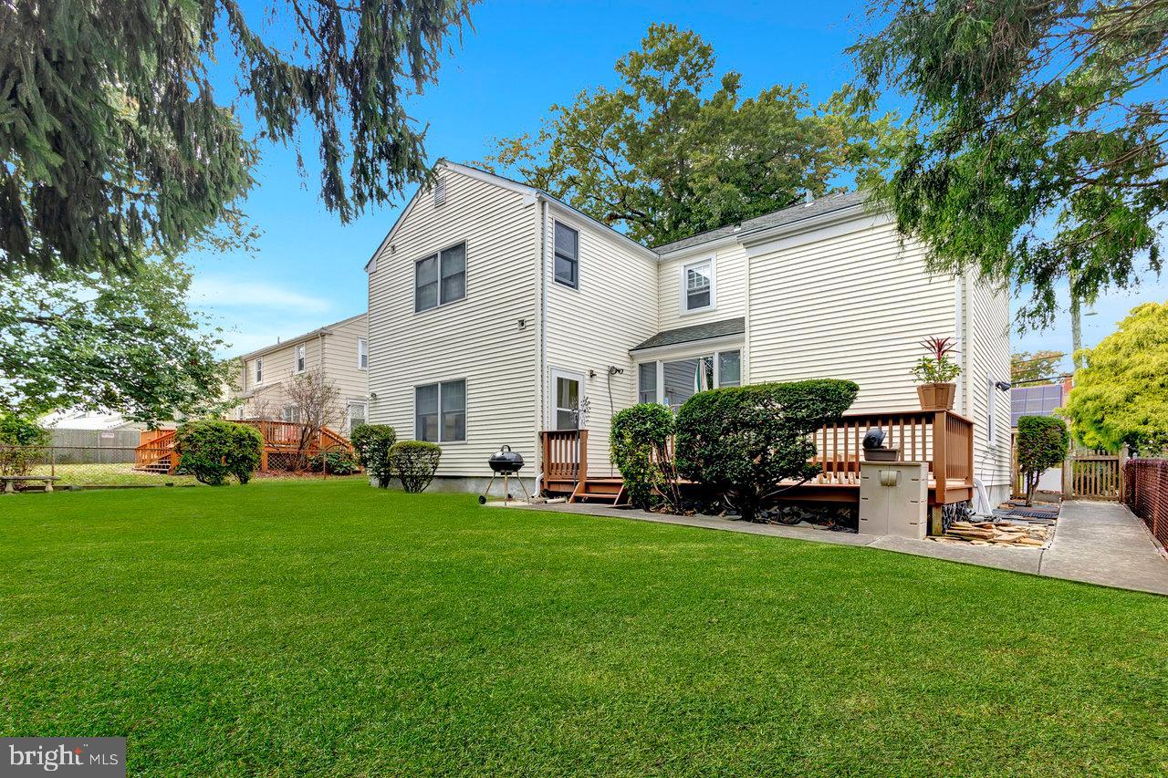 415 Sutherland Road Ewing, NJ 08618 - Photo 25 of 28 a view of a house with a backyard