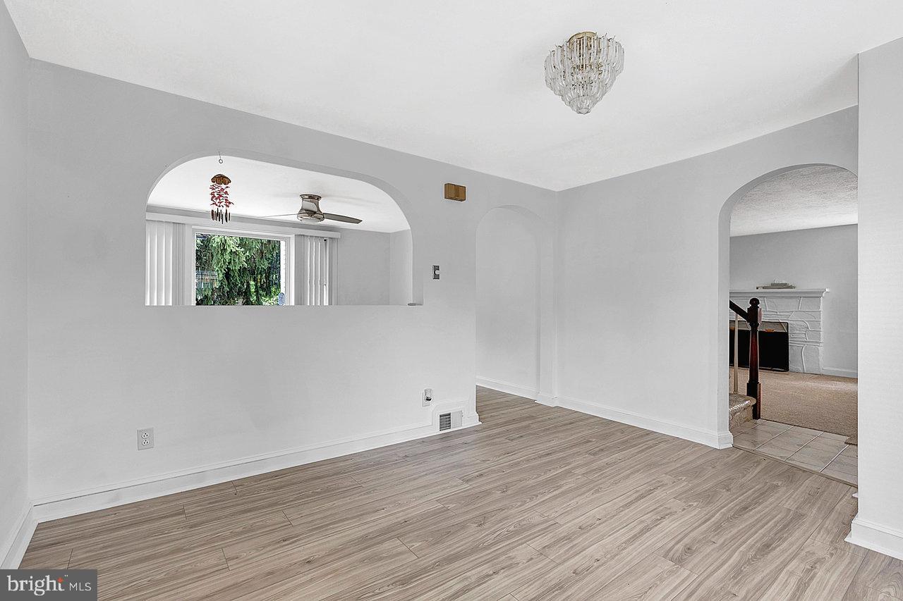 415 Sutherland Road Ewing, NJ 08618 - Photo 4 of 28 a view of empty room with wooden floor