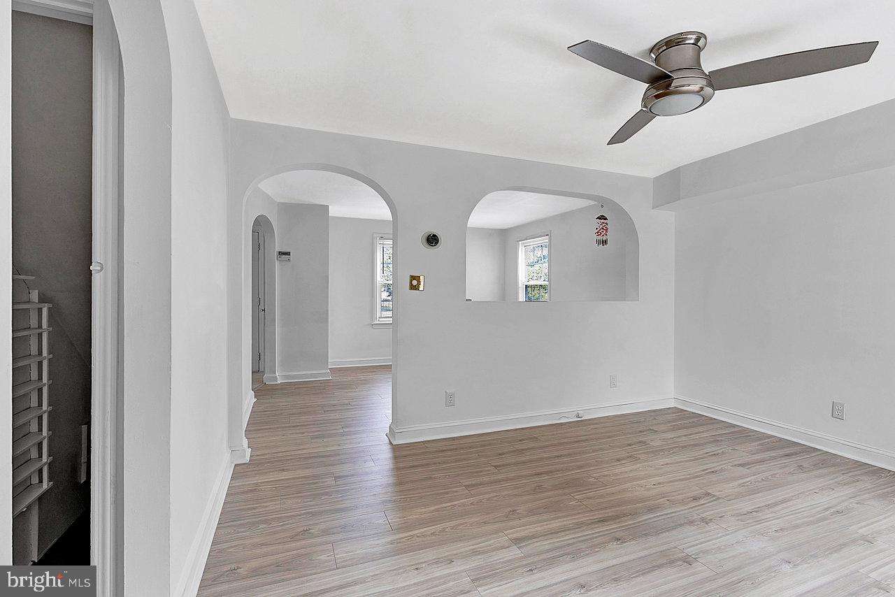 415 Sutherland Road Ewing, NJ 08618 - Photo 7 of 28 a view of a hallway with wooden floor