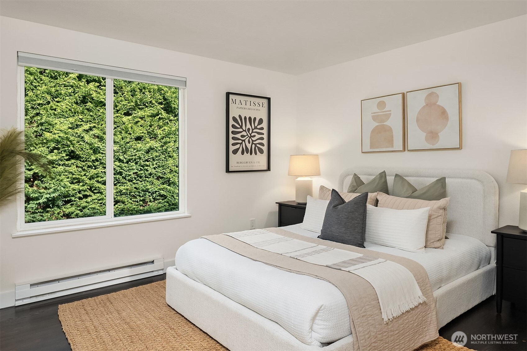 202 West Olympic Place, Unit 405 Seattle, WA 98119 - Photo 15 of 26 a bedroom with bed and a window