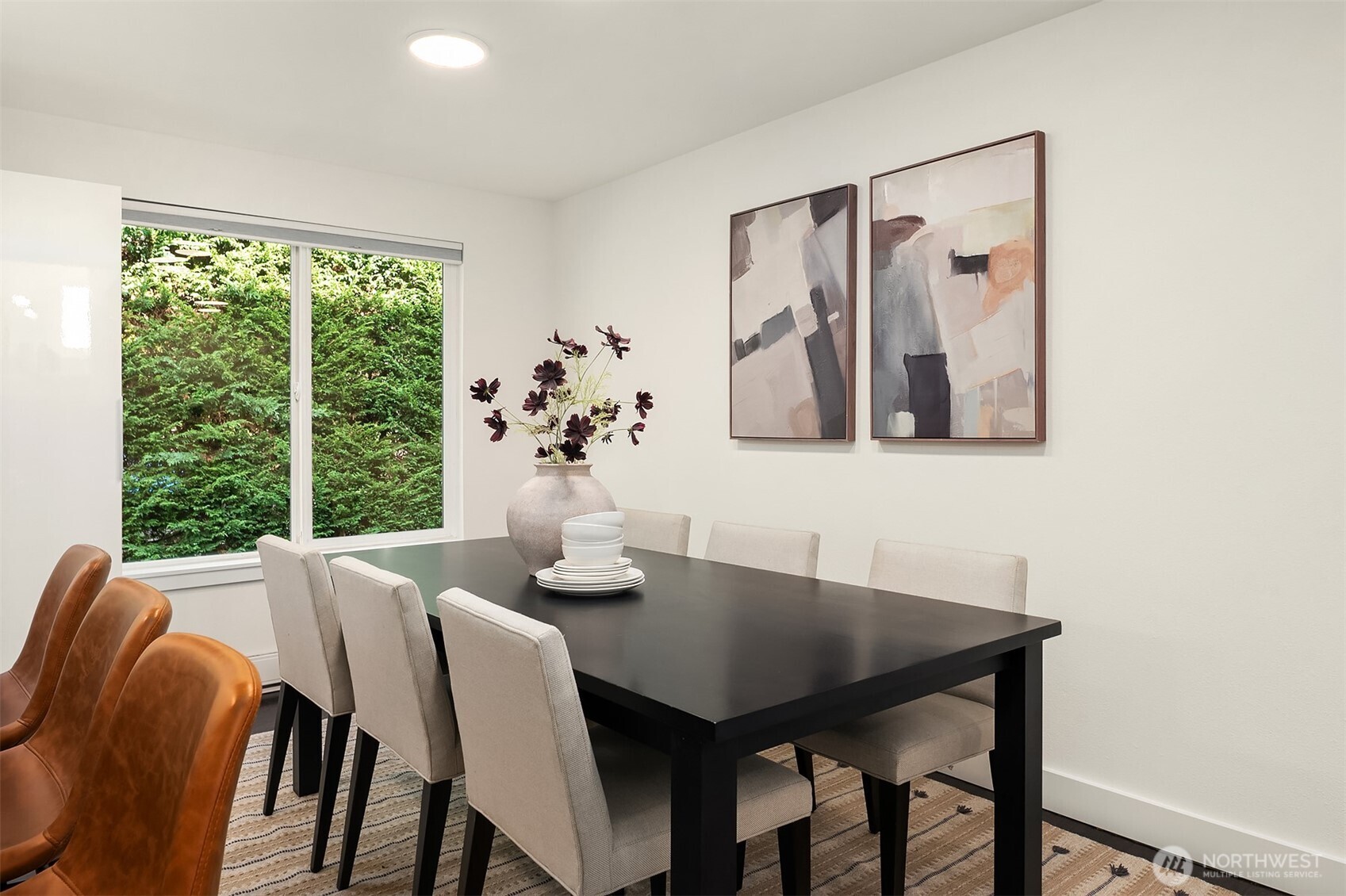 202 West Olympic Place, Unit 405 Seattle, WA 98119 - Photo 10 of 26 a view of a dining room with furniture window and outside view