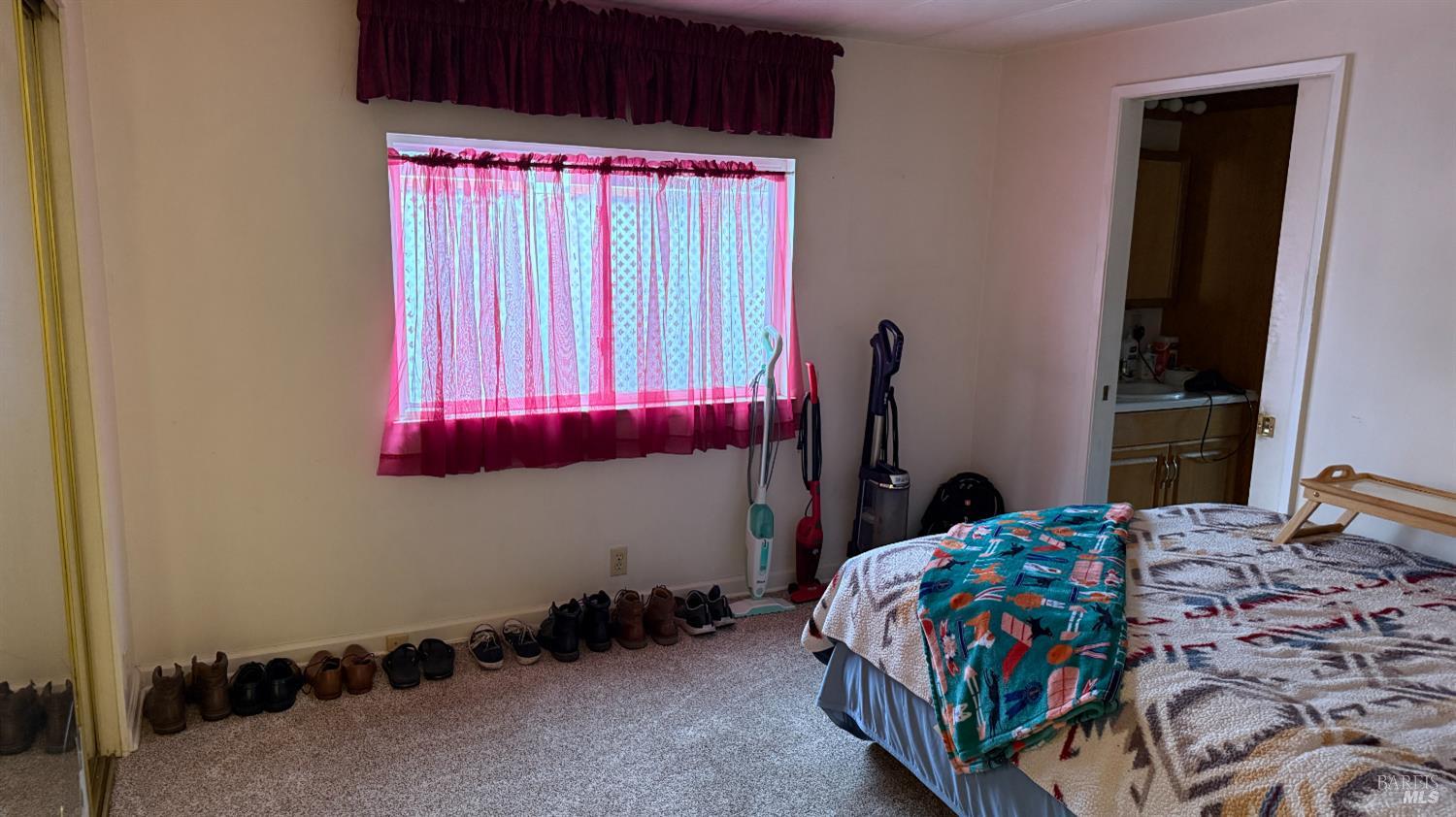 110 San Miguel Road Vallejo, CA 94590 - Photo 3 of 10 a bedroom with bed and a window