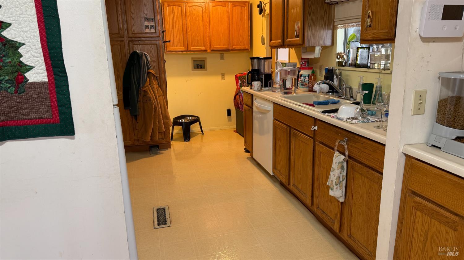 110 San Miguel Road Vallejo, CA 94590 - Photo 6 of 10 a view of a kitchen with appliances and a window