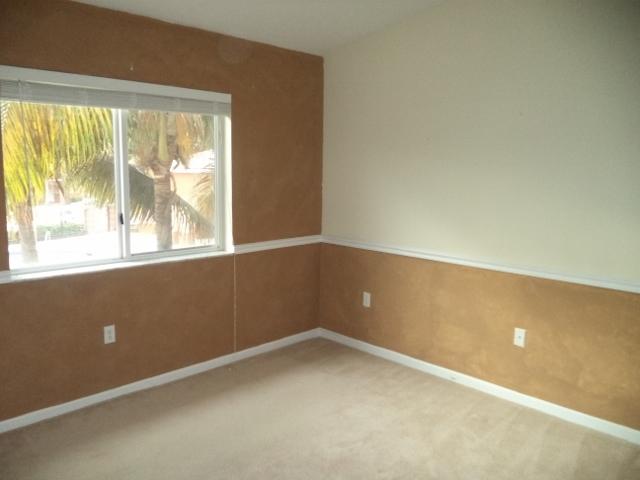 3750 North Jog Road, Unit 203 West Palm Beach, FL 33411 - Photo 9 of 10 an empty room with a window