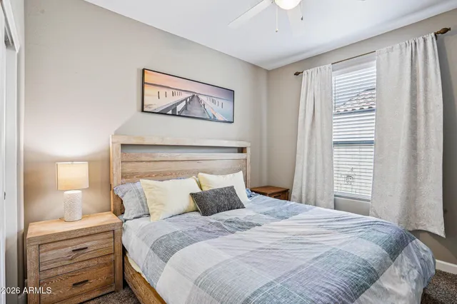 a dining room with furniture and front door