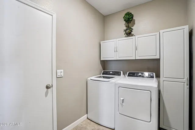 a view of a swimming pool with a lounge chairs