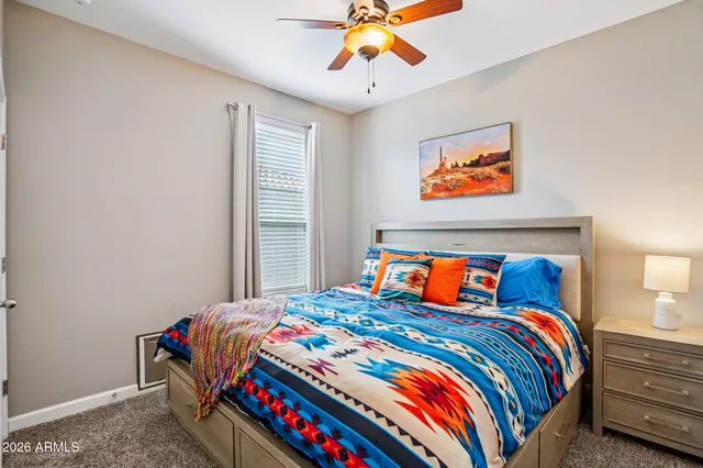 a view of a swimming pool with an outdoor seating