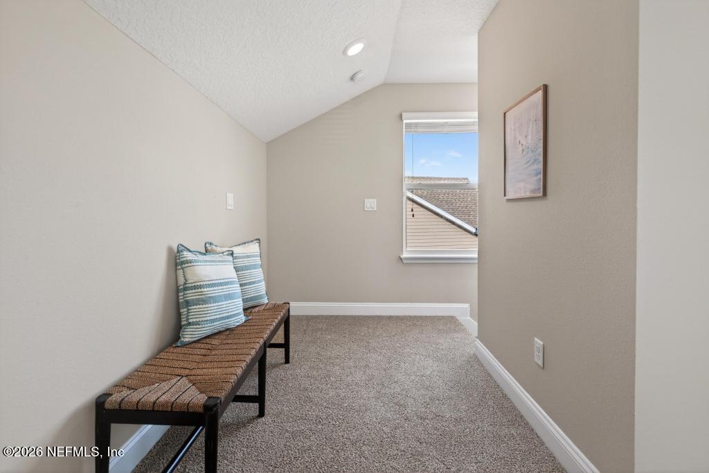 383 Sweet Oak Way St. Augustine, FL 32095 - Photo 56 of 74 a view of room with stairs and wooden floor