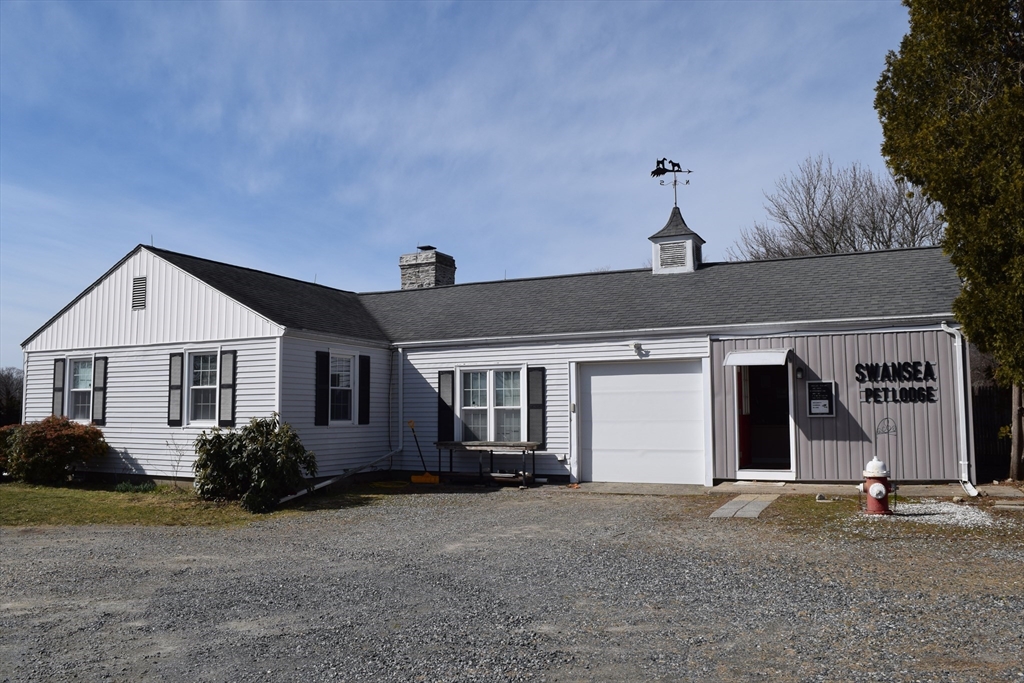 475 Cedar Avenue Swansea, MA 02777 - Photo 1 of 42 a view of a house with a yard