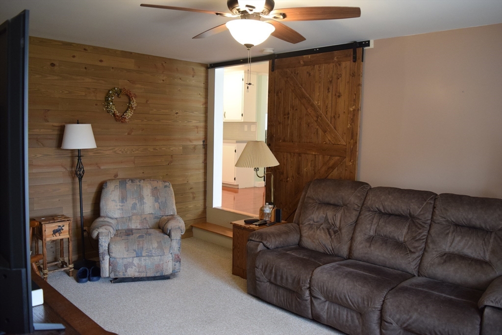 475 Cedar Avenue Swansea, MA 02777 - Photo 15 of 42 a living room with furniture and a window