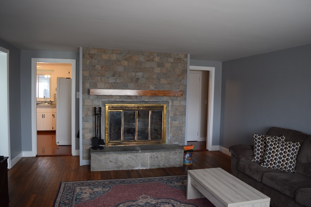 475 Cedar Avenue Swansea, MA 02777 - Photo 17 of 42 a living room with furniture and a window