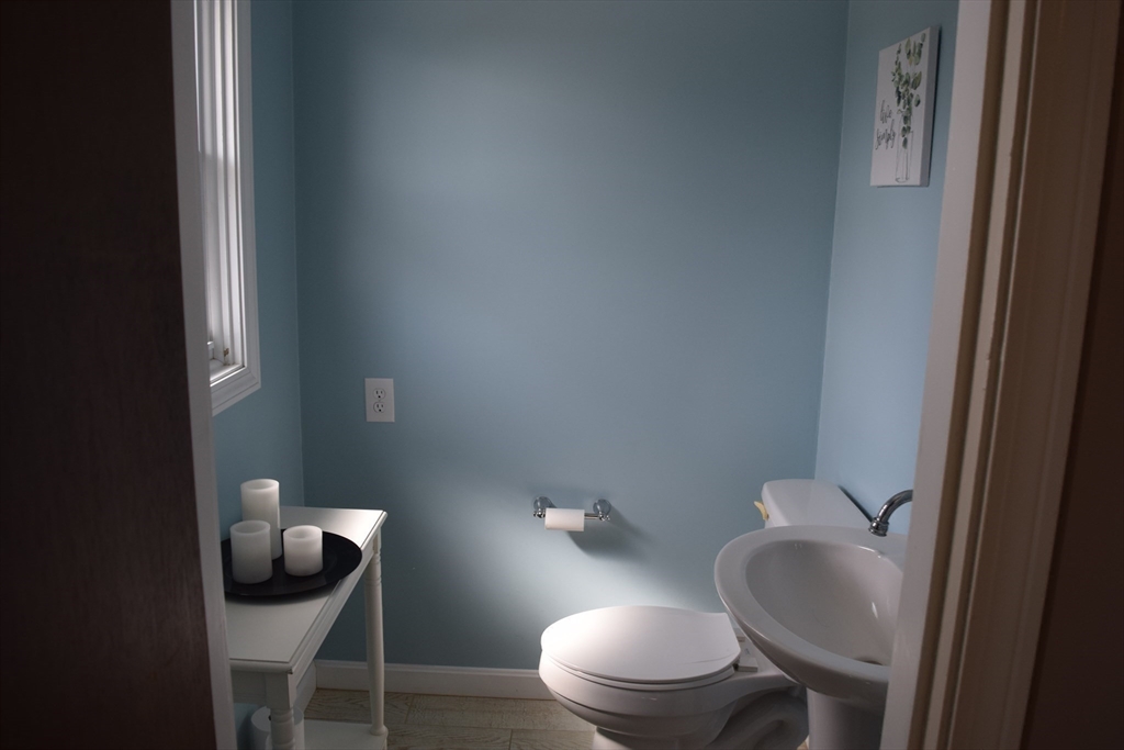 475 Cedar Avenue Swansea, MA 02777 - Photo 19 of 42 a bathroom with a toilet and a sink